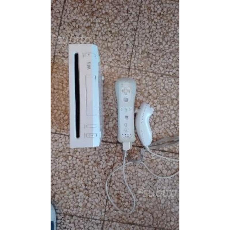 Wii + 4 giochi + controller