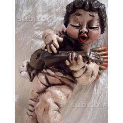 Thun putto con chitarra serie putti musici